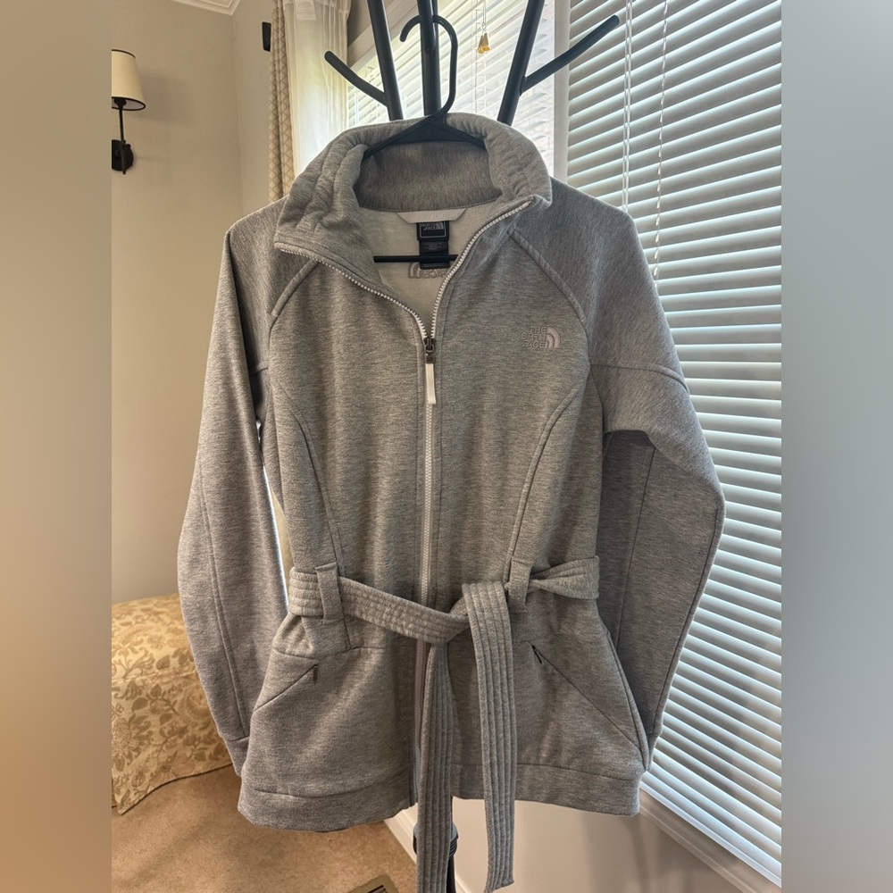 The North Face long zip-up jacket with belt